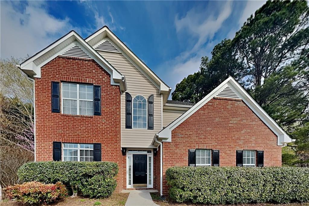 2730 Jona Trail Dacula, GA 30019 - Photo 1 of 19 a view of a house with a yard