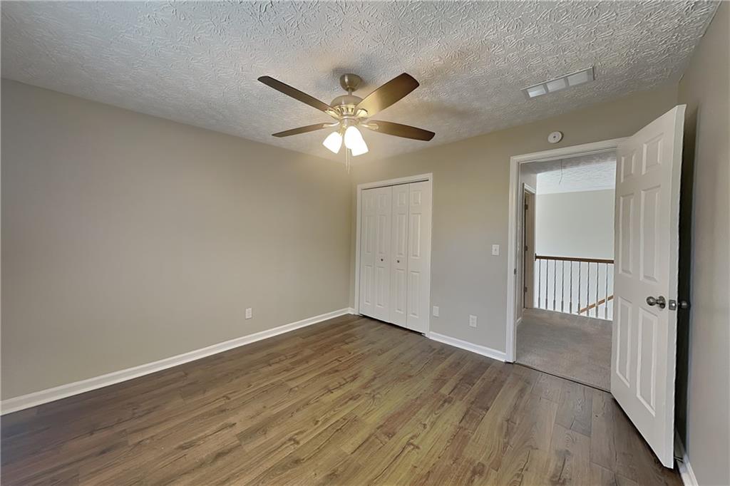 2730 Jona Trail Dacula, GA 30019 - Photo 10 of 19 a view of an empty room with a window