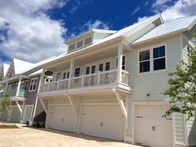 70 York Ln Inlet Beach, Unit B Inlet Beach, FL 32461 - Photo 1 of 39 a front view of a house with a yard