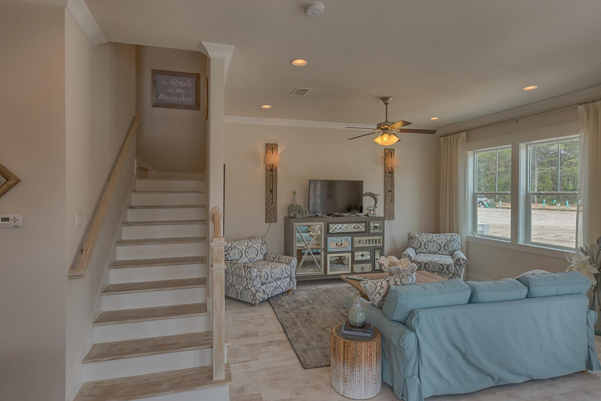 70 York Ln Inlet Beach, Unit B Inlet Beach, FL 32461 - Photo 14 of 39 a living room with furniture and a flat screen tv