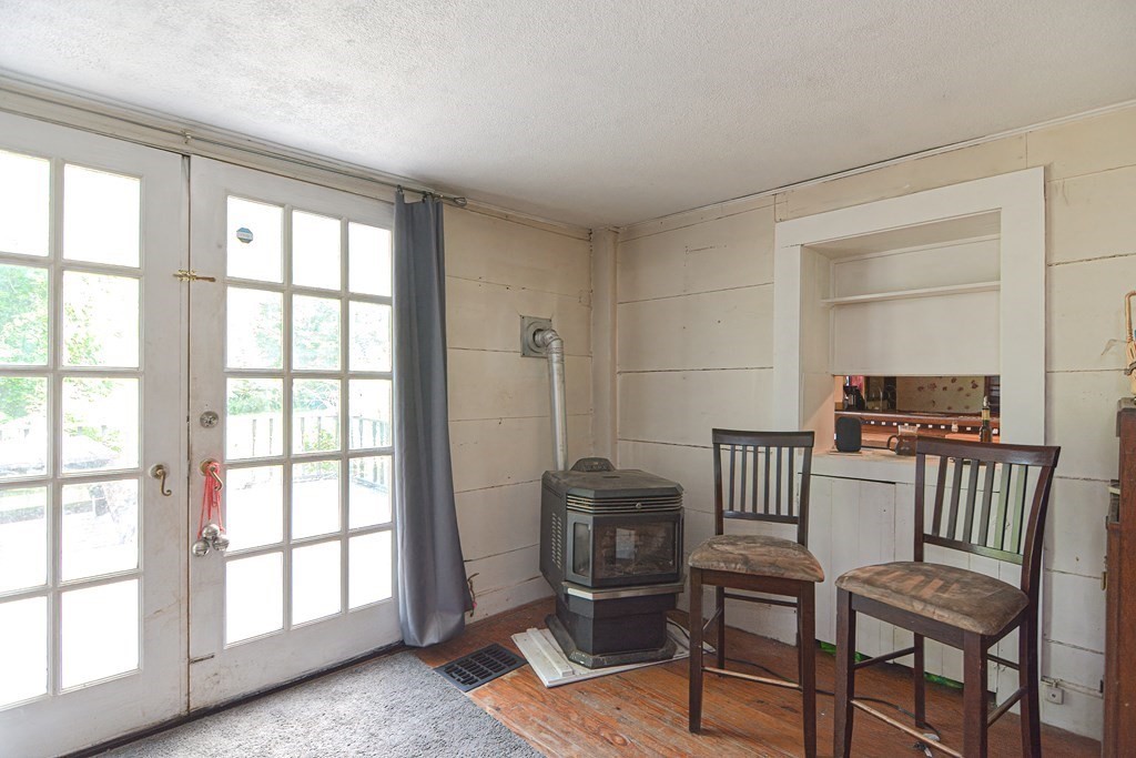 215 Burlingame Road Palmer, MA 01069 - Photo 16 of 41 a view of a room with furniture and windows