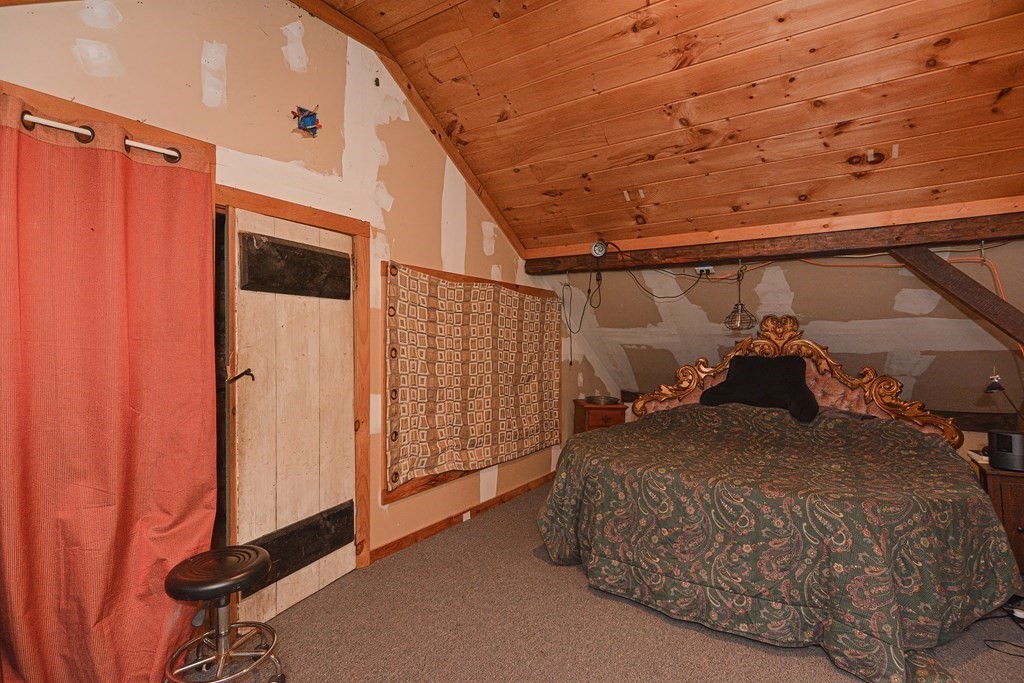 215 Burlingame Road Palmer, MA 01069 - Photo 31 of 41 a bedroom with a bed and a window