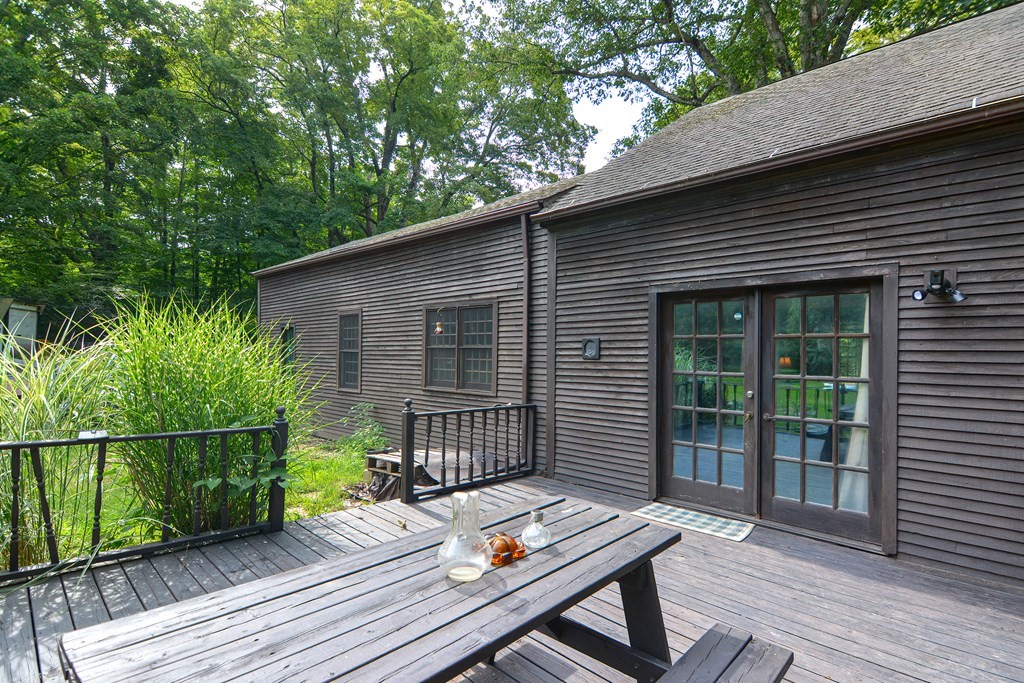 215 Burlingame Road Palmer, MA 01069 - Photo 34 of 41 a deck view with a seating space