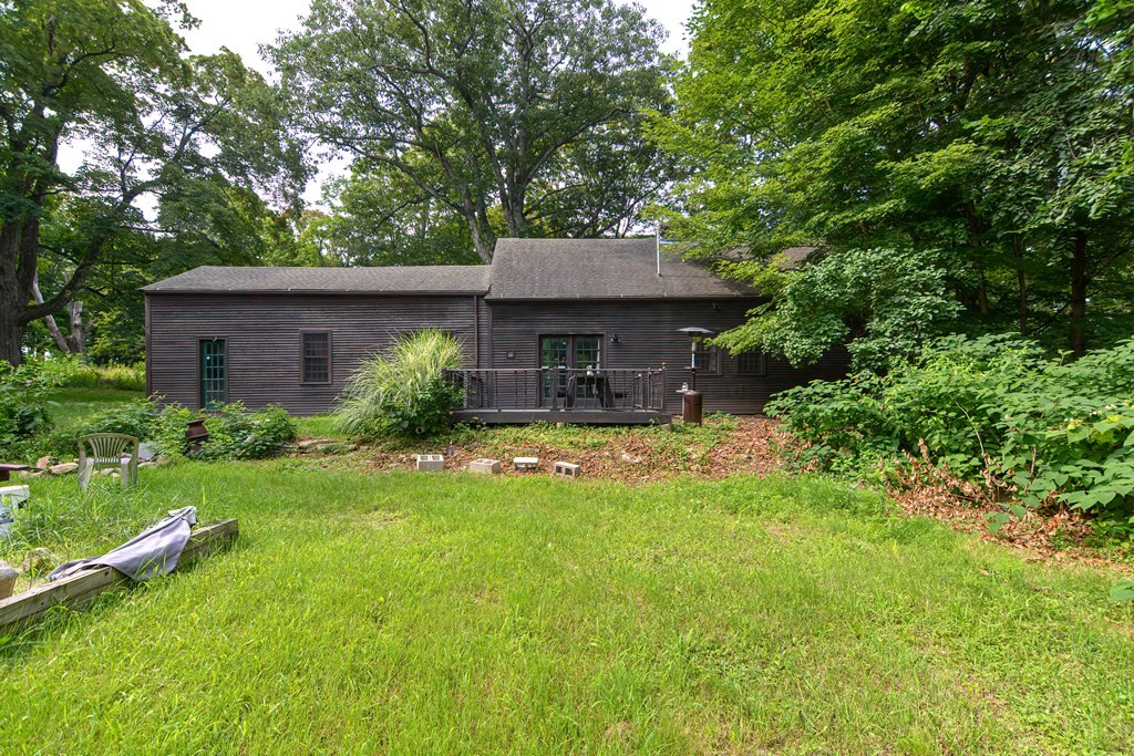 215 Burlingame Road Palmer, MA 01069 - Photo 36 of 41 a house view with a garden space