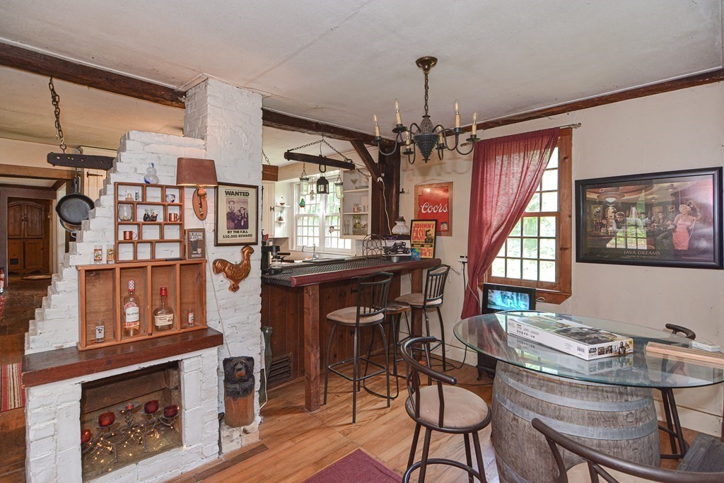 215 Burlingame Road Palmer, MA 01069 - Photo 5 of 41 a view of a livingroom with furniture window and wooden floor