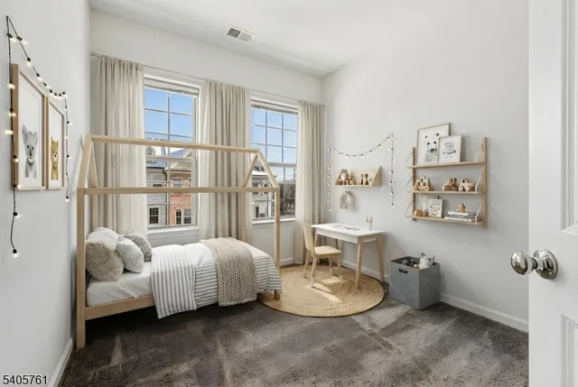 a bedroom with furniture and a couch