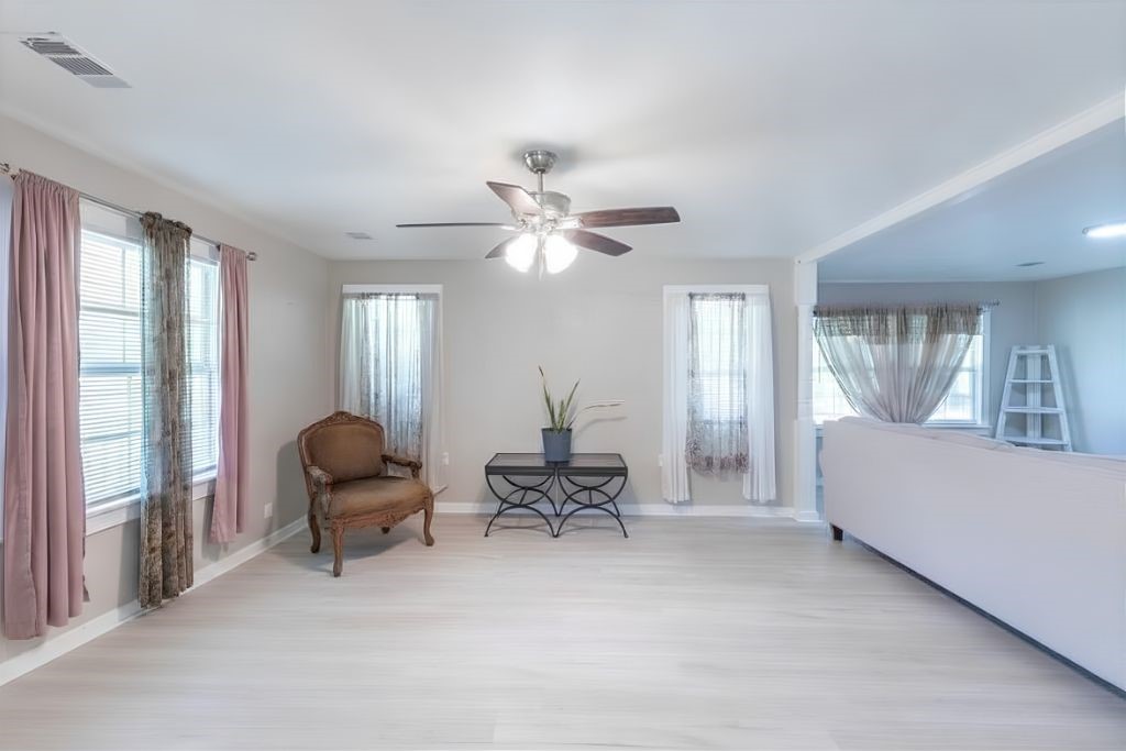 2118 Rolling Hills Road Conroe, TX 77303 - Photo 5 of 39 This family room creates a comfortable space for gathering with family and friends.