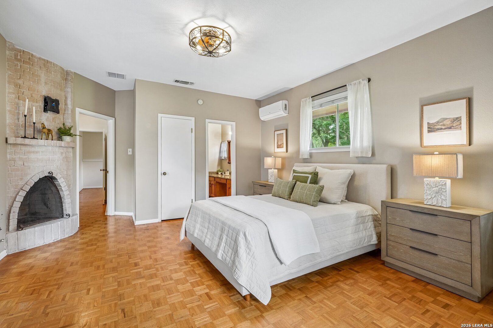 20632 Timber Rose Drive Garden Ridge, TX 78266 - Photo 35 of 46 a spacious bedroom with a bed and a table in it