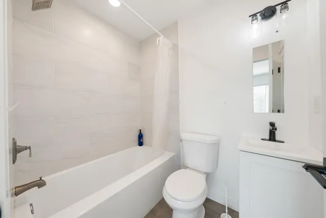 a room with a bed and a window