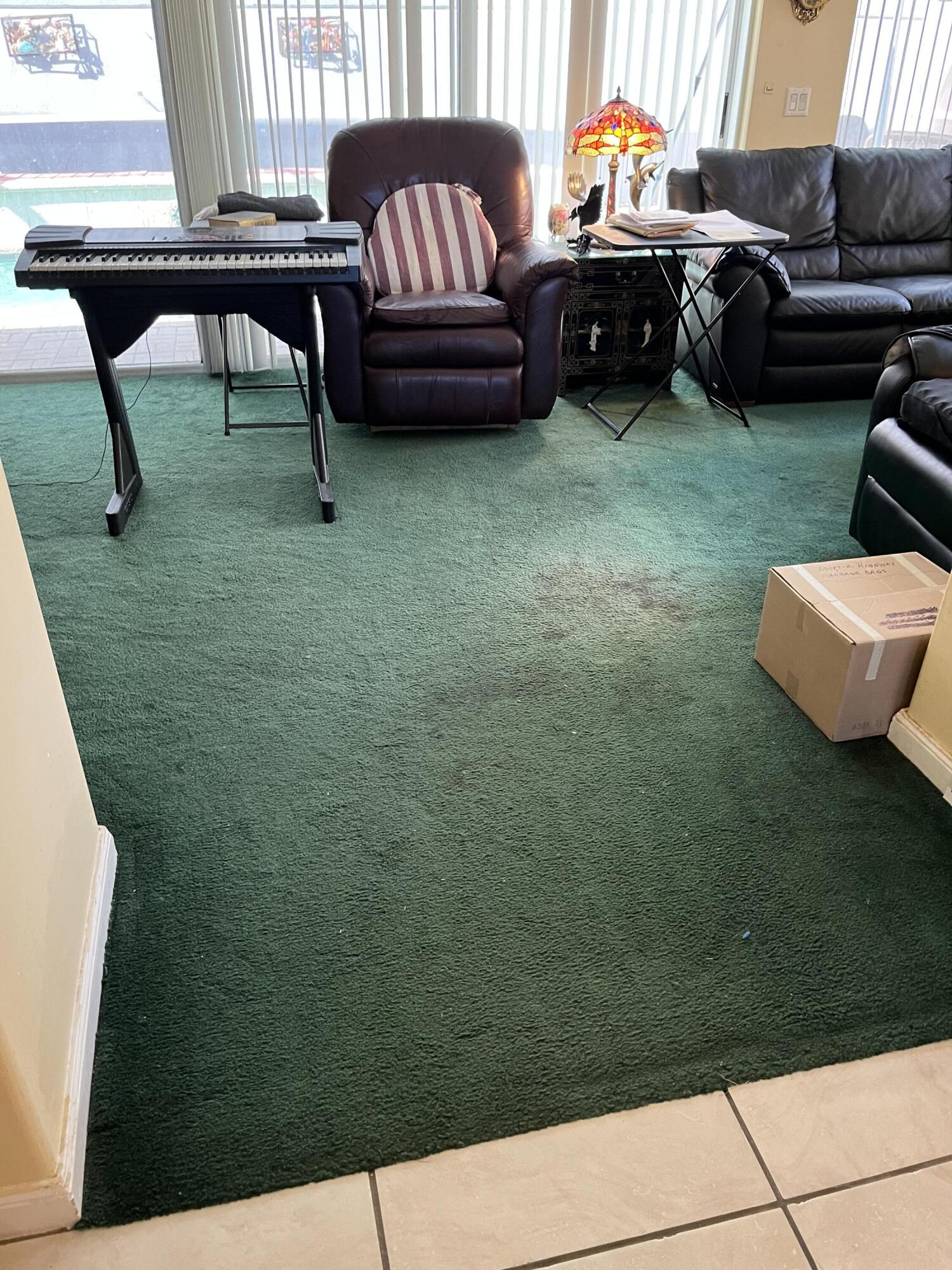 206 South Hampton Drive Jupiter, FL 33458 - Photo 4 of 24 a living room with furniture