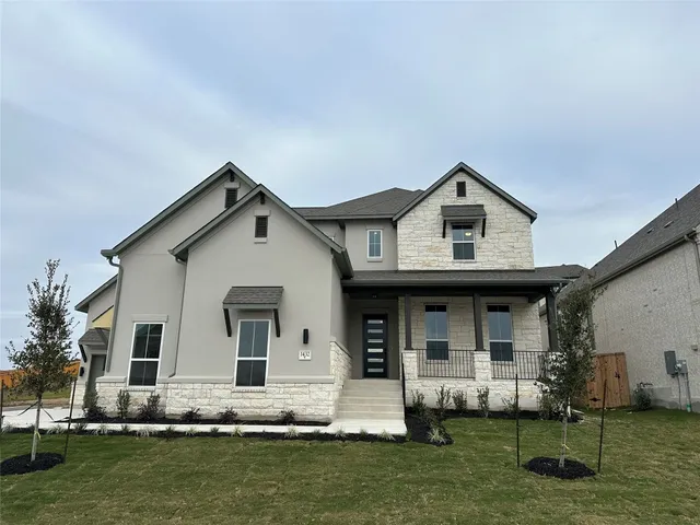 a front view of house with yard