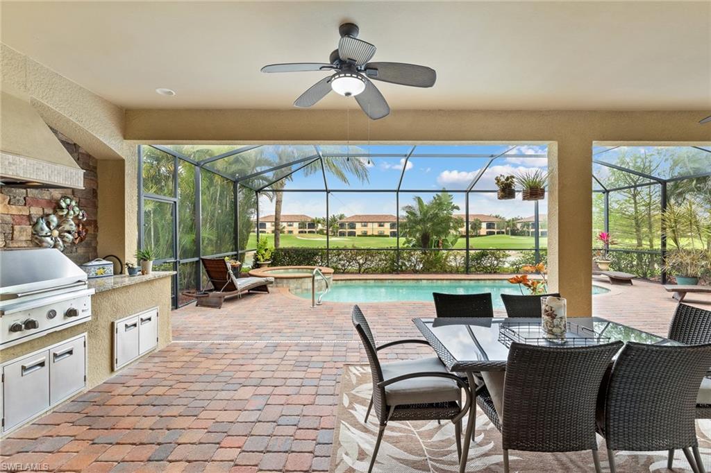 28529 Westmeath Court Bonita Springs, FL 34135 - Photo 20 of 49 a living room with patio furniture and a large window
