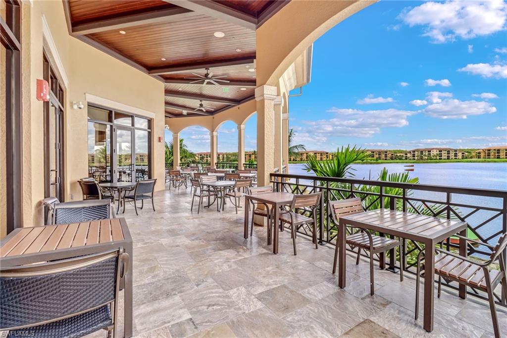 28529 Westmeath Court Bonita Springs, FL 34135 - Photo 39 of 49 a view of a patio with dining table and chairs with a patio