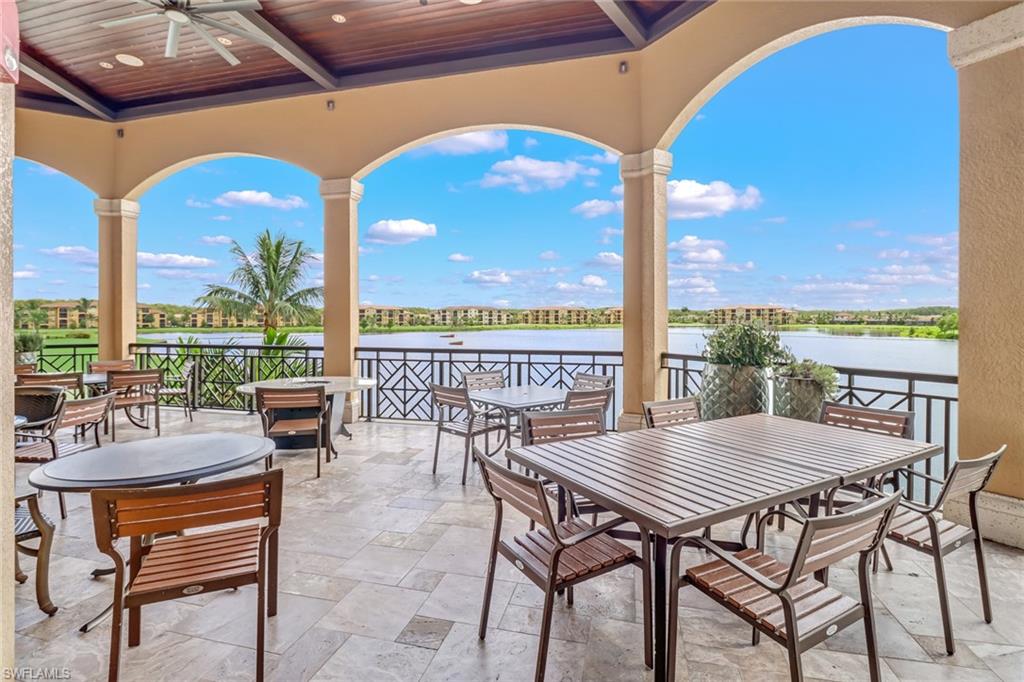 28529 Westmeath Court Bonita Springs, FL 34135 - Photo 41 of 49 a view of a patio with a table chairs and a swimming pool
