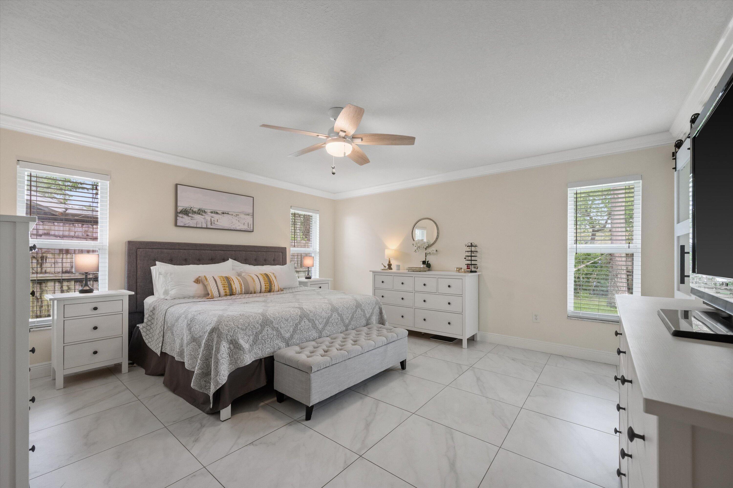 1064 Raintree Lane Wellington, FL 33414 - Photo 18 of 39 Primary Bedroom