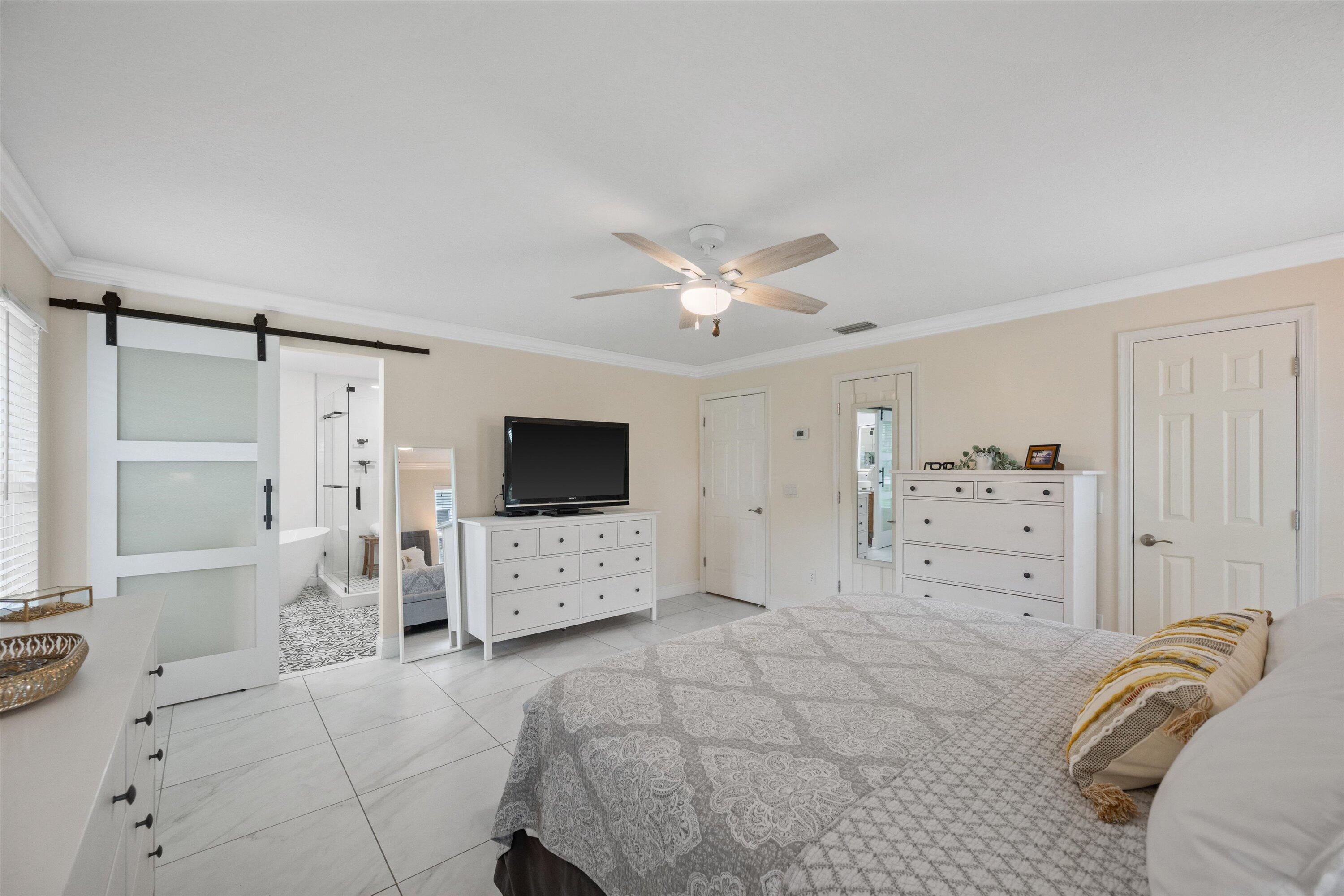 1064 Raintree Lane Wellington, FL 33414 - Photo 19 of 39 Primary Bedroom