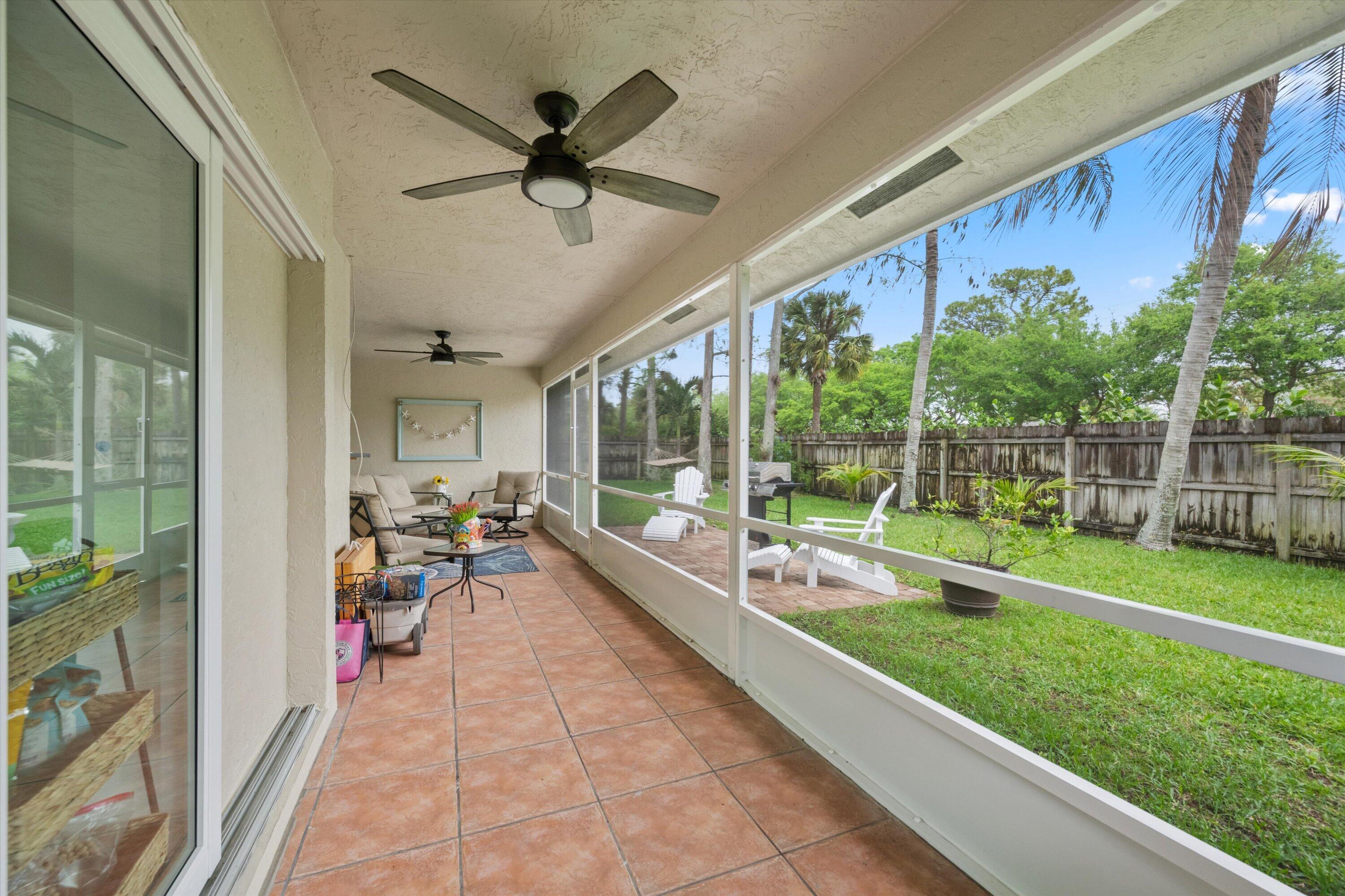 1064 Raintree Lane Wellington, FL 33414 - Photo 29 of 39 Enclosed Porch