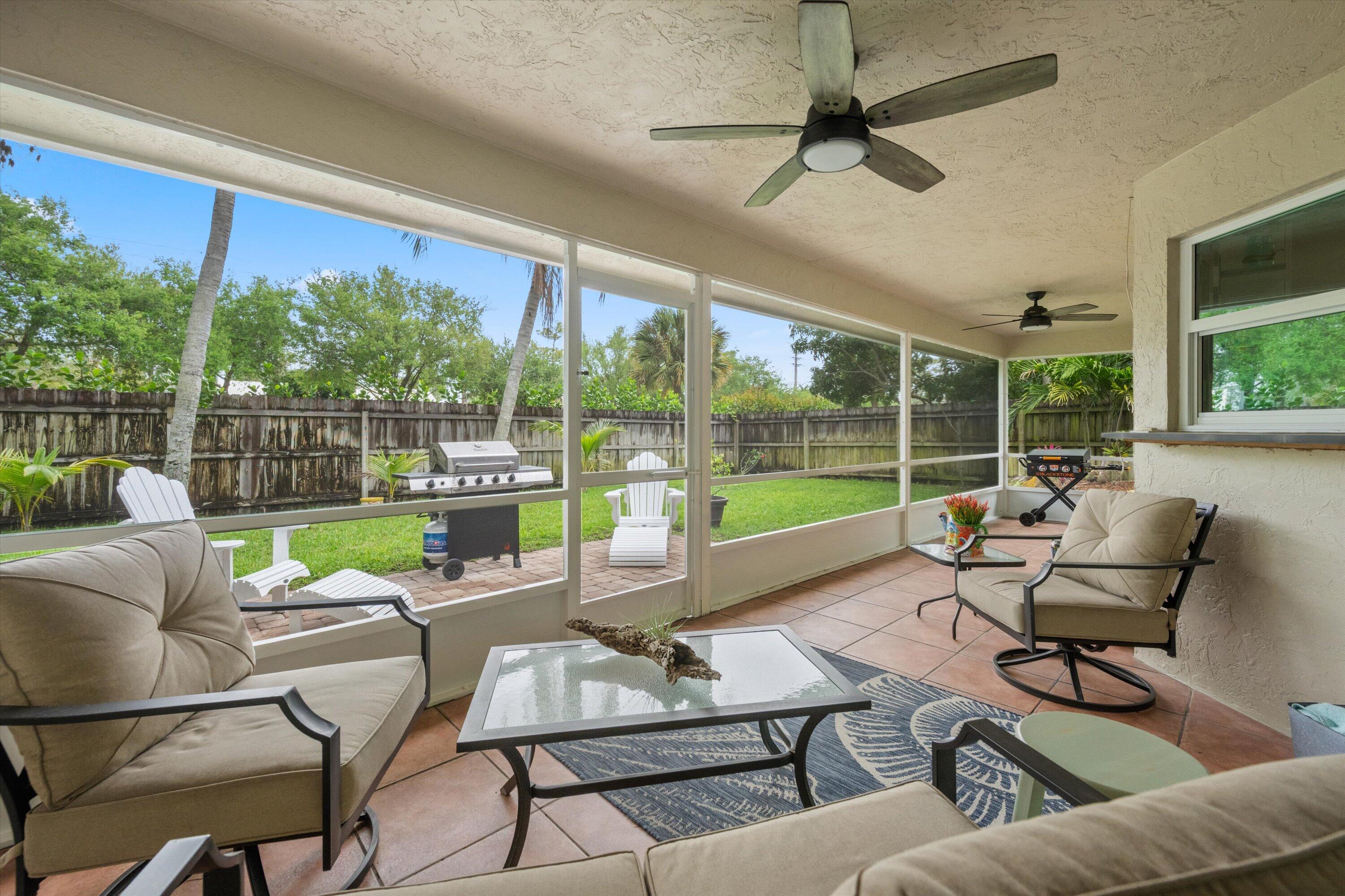 1064 Raintree Lane Wellington, FL 33414 - Photo 30 of 39 Enclosed Porch