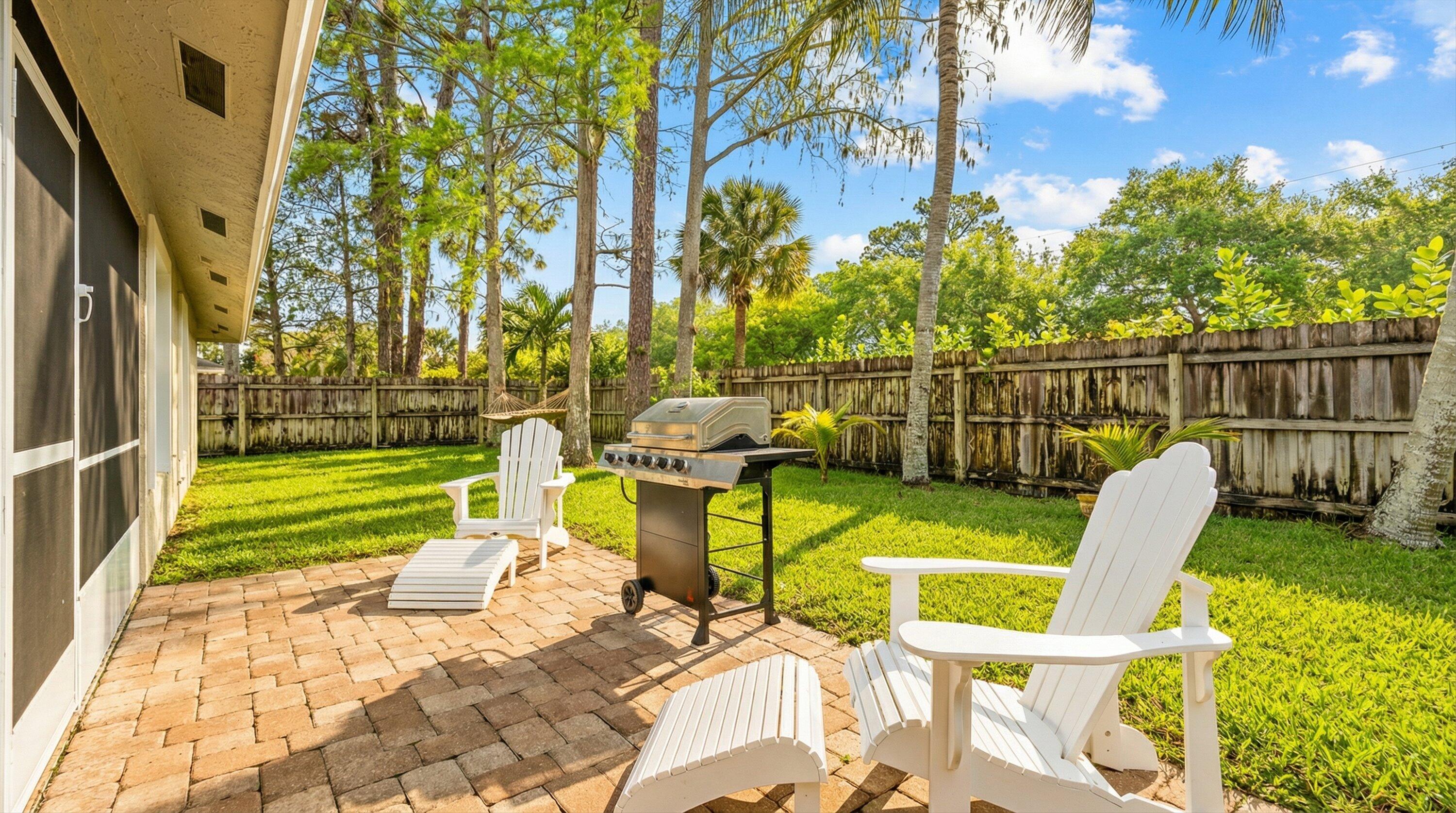 1064 Raintree Lane Wellington, FL 33414 - Photo 31 of 39 Back Patio