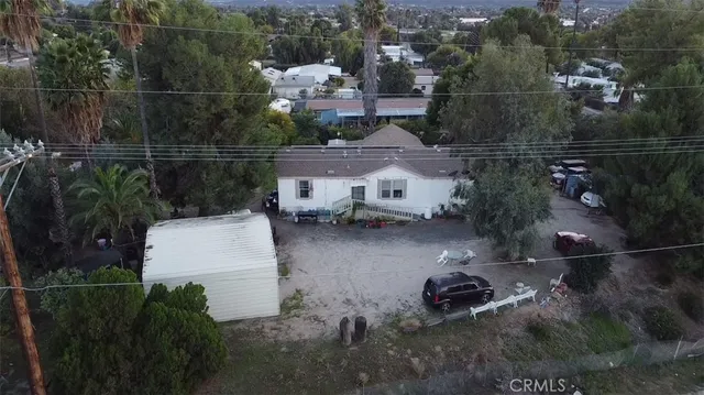 a view of a chair and table in the patio