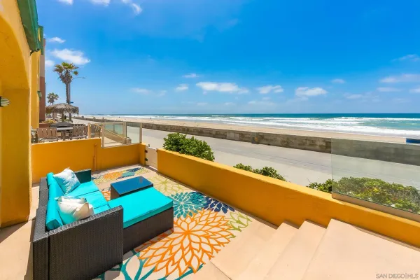 a table and chairs sitting on a patio