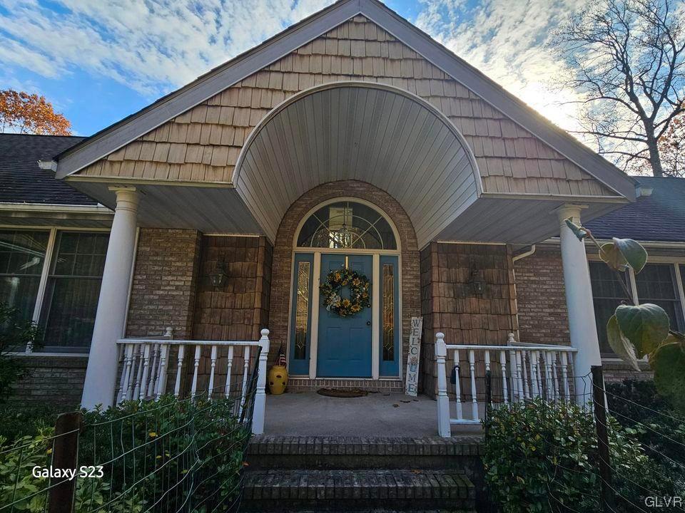 a view of a house with a porch