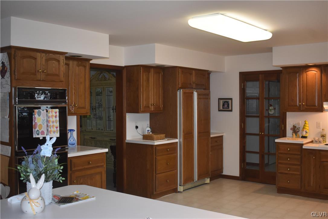 2801 Valley View Drive Bangor, PA 18013 - Photo 16 of 30 a kitchen with stainless steel appliances kitchen island granite countertop a refrigerator and cabinets