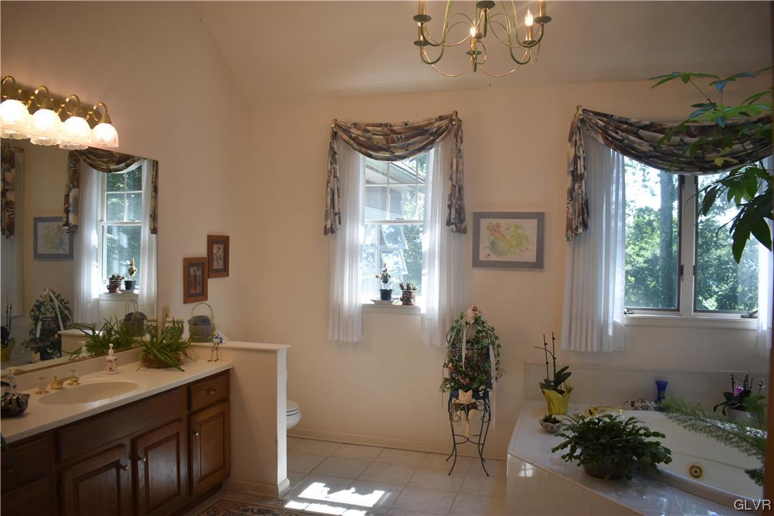 2801 Valley View Drive Bangor, PA 18013 - Photo 20 of 30 a bathroom with a sink mirror and window