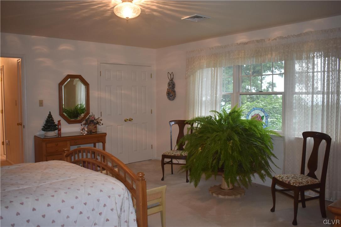2801 Valley View Drive Bangor, PA 18013 - Photo 22 of 30 a bedroom with furniture and a potted plant