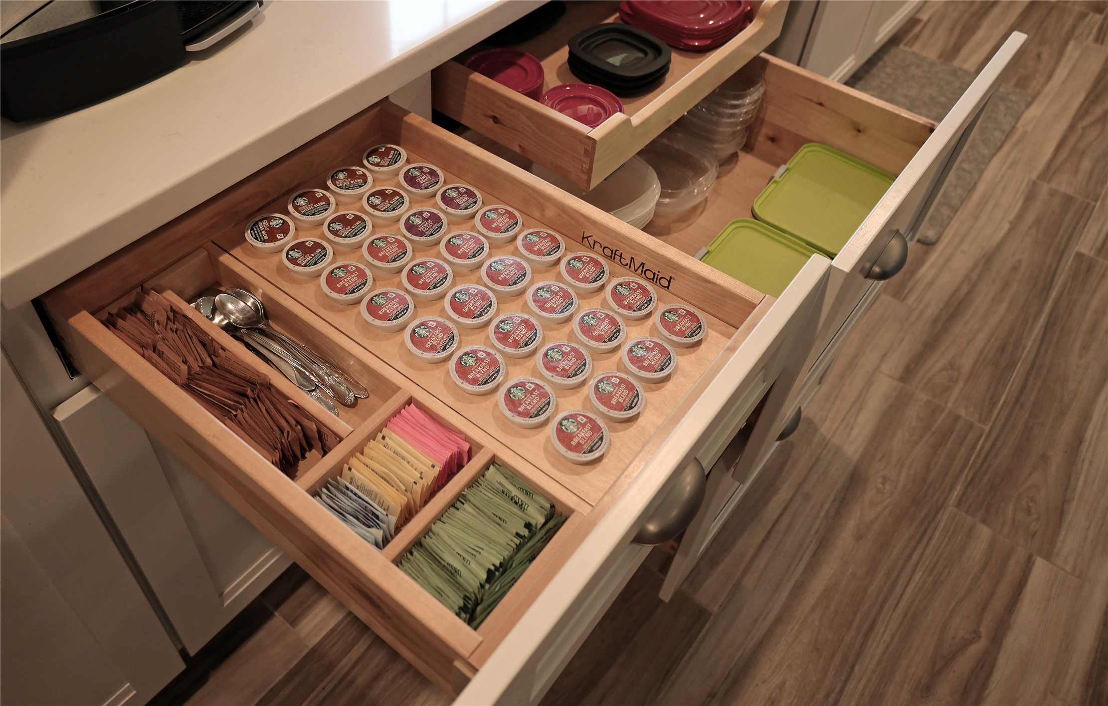 3319 Shadowcrest Lane Spring, TX 77380 - Photo 16 of 37 High end Kraft Maid cabinets with custom pull-out drawers for functional storage solutions.