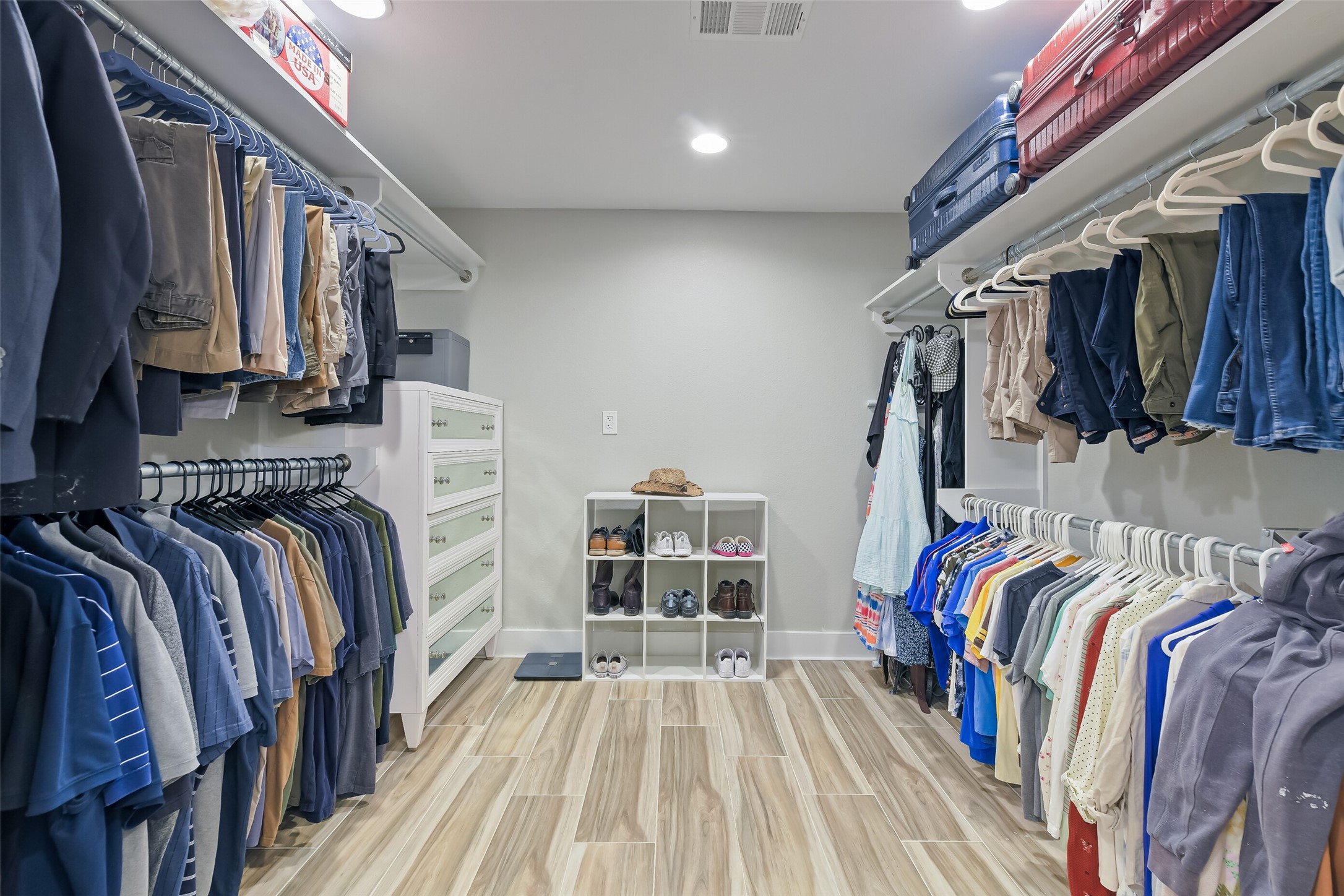 3319 Shadowcrest Lane Spring, TX 77380 - Photo 25 of 37 Experience ultimate organization in the spacious primary closet, equipped with ample shelves and hanging space for your wardrobe.