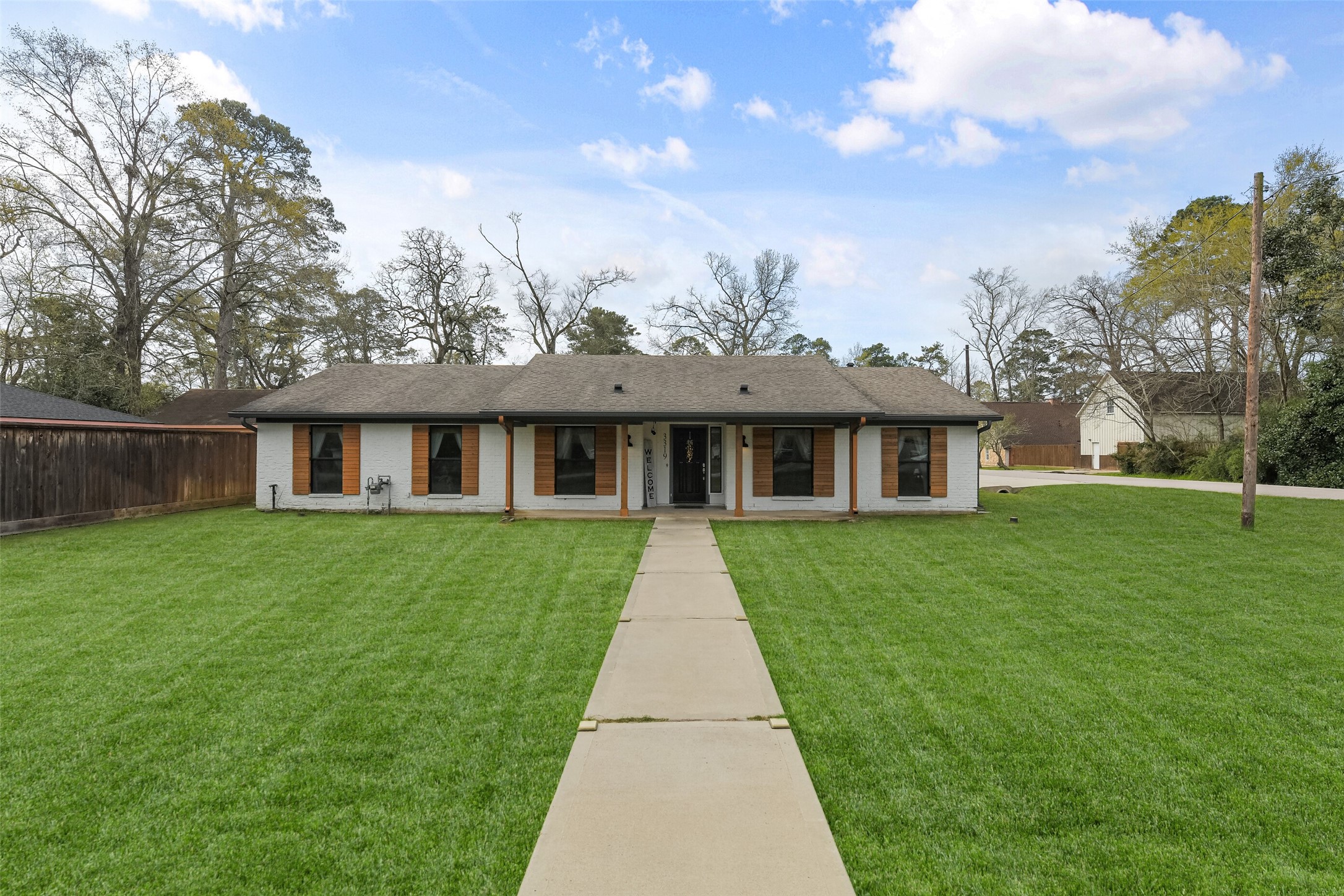 3319 Shadowcrest Lane Spring, TX 77380 - Photo 4 of 37 The 2018 complete remodel included double-paned Milgard windows with functional protective shutters, a seamless 6-inch gutter system with matching downspouts and convenient duplex plugs under the eaves for holiday lighting.