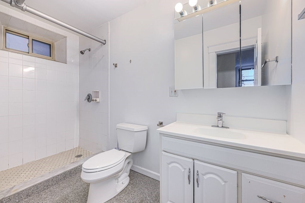 52 Garden Street, Unit B2 Cambridge, MA 02138 - Photo 11 of 17 a bathroom with a sink a toilet and shower