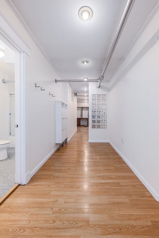52 Garden Street, Unit B2 Cambridge, MA 02138 - Photo 3 of 17 a view of empty room with wooden floor