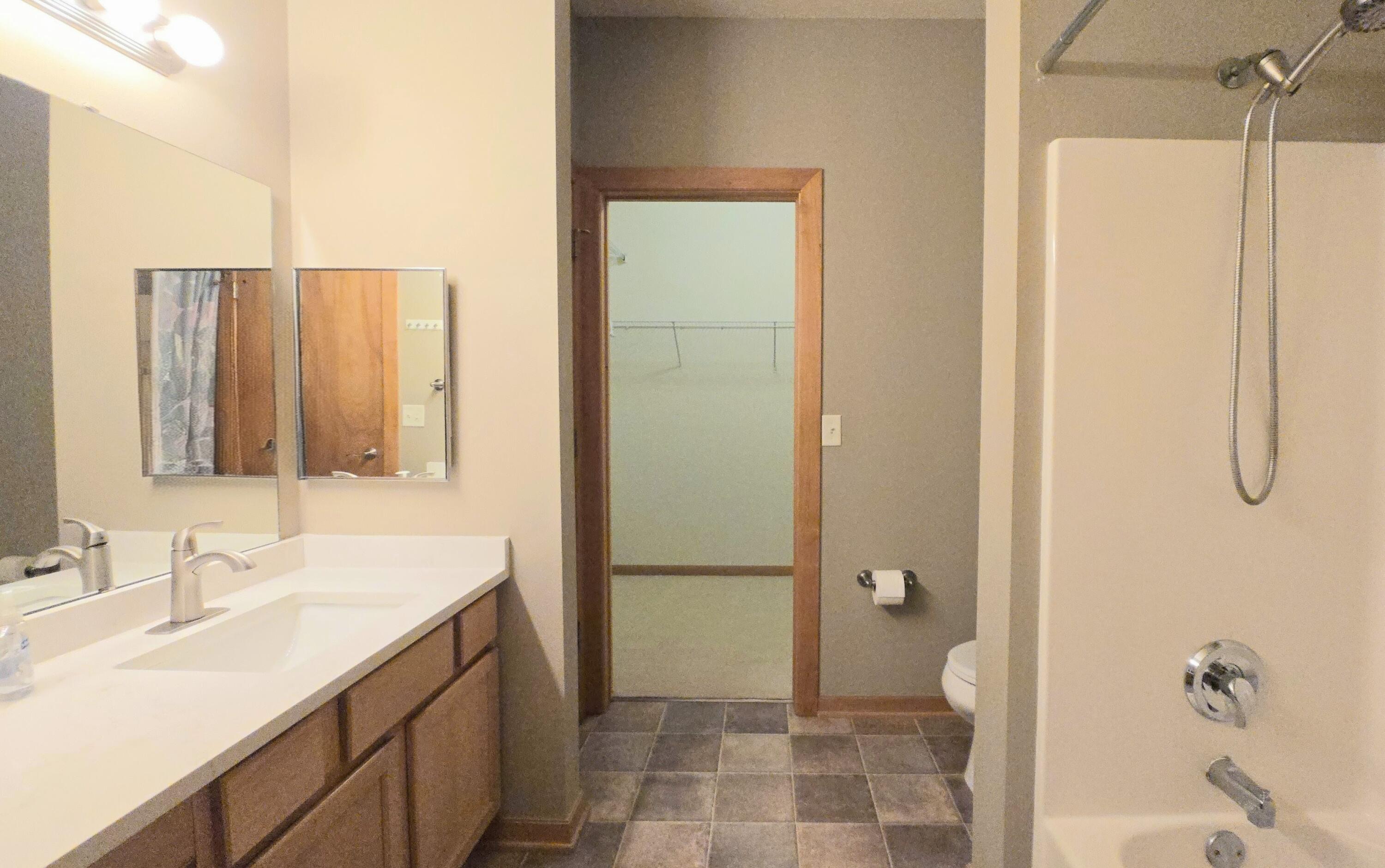 10900 West Bluemound Road, Unit 215 Wauwatosa, WI 53226 - Photo 12 of 17 MASTER BATH WITH WALK IN CLOSET