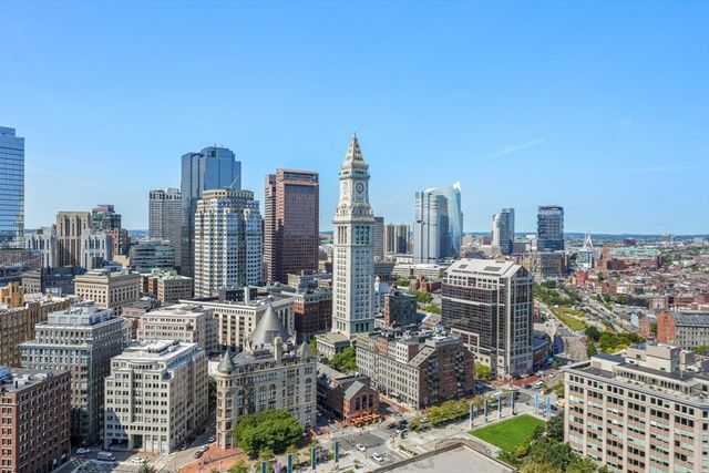a view of city with tall buildings