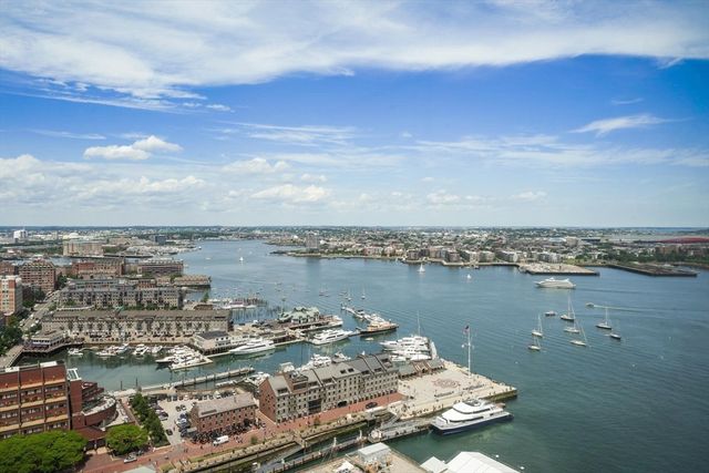 a view of a lake with a city