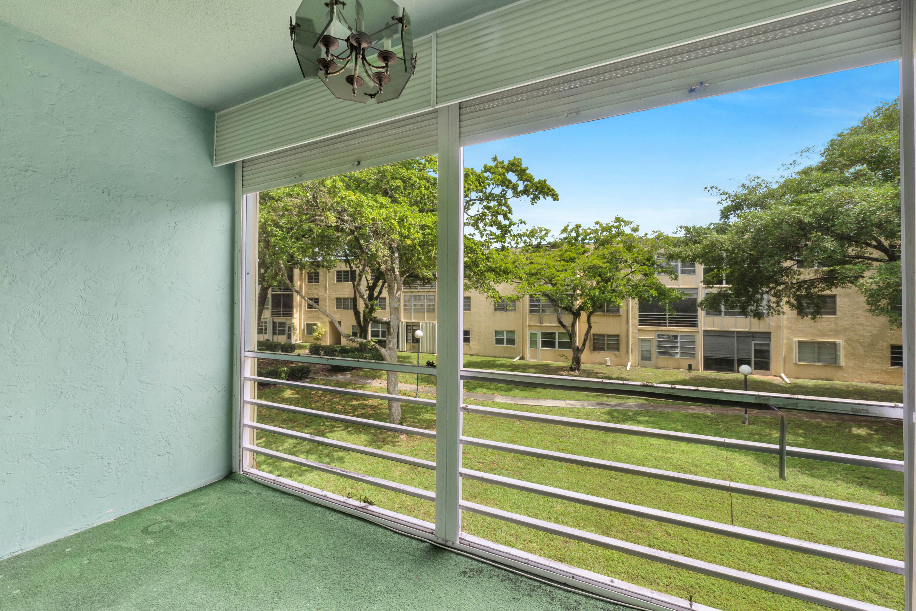 301 Cambridge Road, Unit 202 Hollywood, FL 33024 - Photo 8 of 38 Lanai