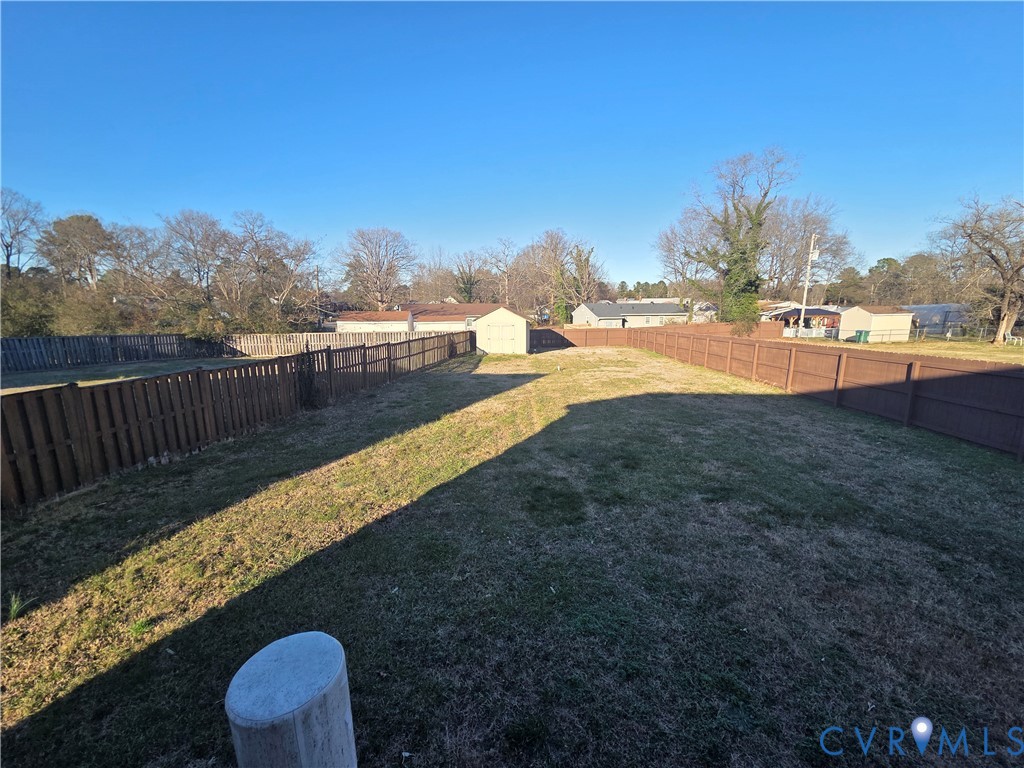 4504 Warwick Road Richmond, VA 23234 - Photo 14 of 15 a view of swimming pool with a yard