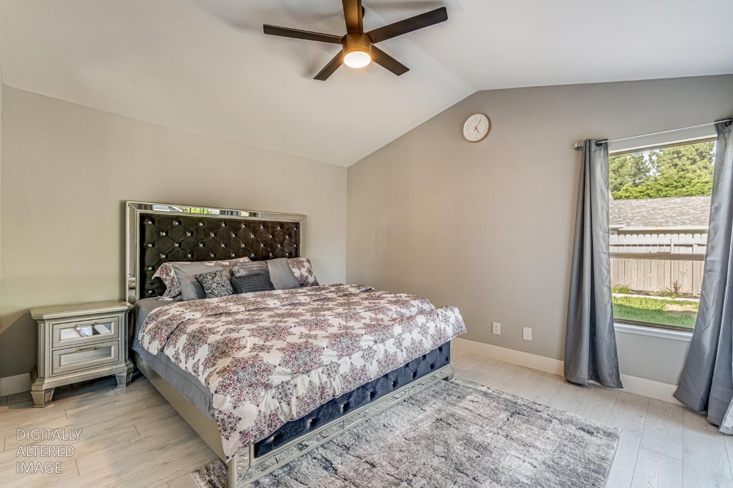 2 Rio Campo Court Sacramento, CA 95834 - Photo 12 of 24 a bedroom with a bed and a window