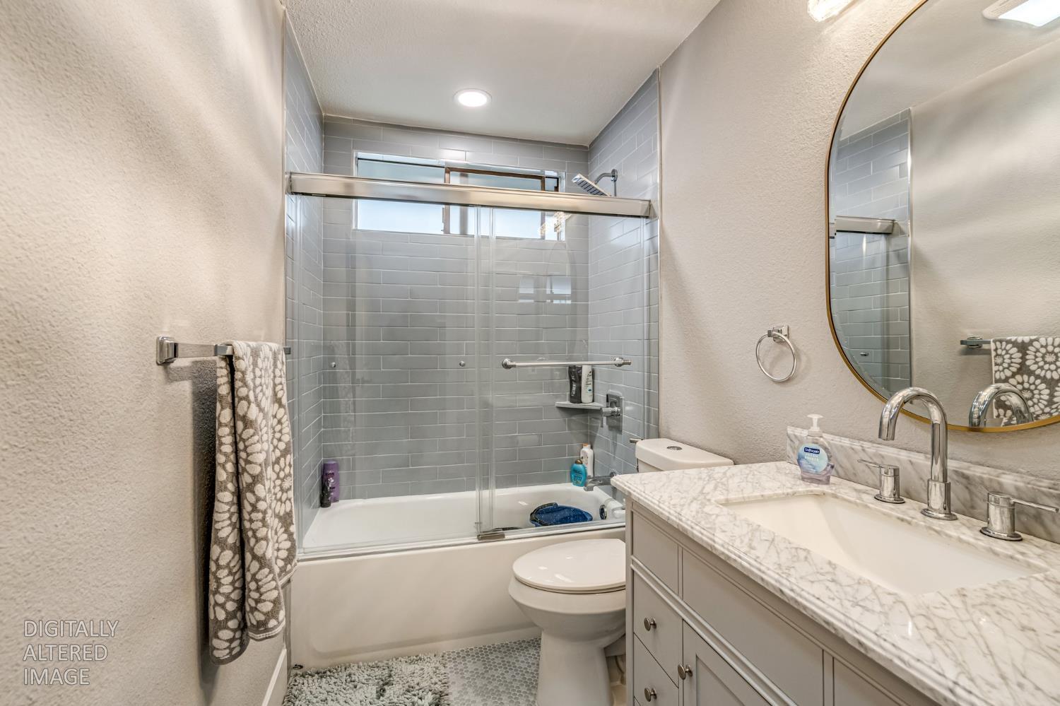 2 Rio Campo Court Sacramento, CA 95834 - Photo 16 of 24 a bathroom with a granite countertop sink toilet and shower