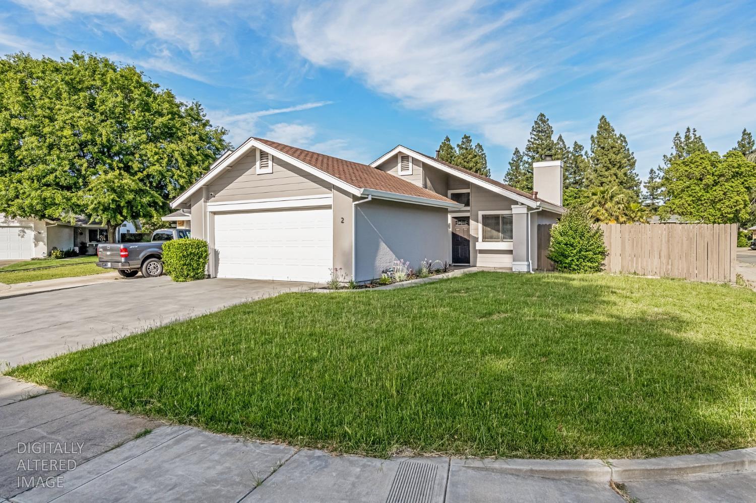 2 Rio Campo Court Sacramento, CA 95834 - Photo 2 of 24 a view of a house with a yard