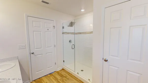 a view of a room with a sink and a window