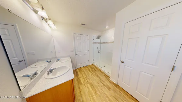 a view of a room with racks on the wall