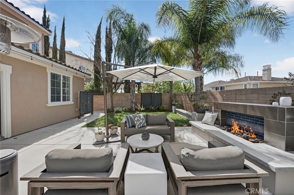 46093 Hunter Trail Temecula, CA 92592 - Photo 67 of 75 Virtually edited for fire in fireplace