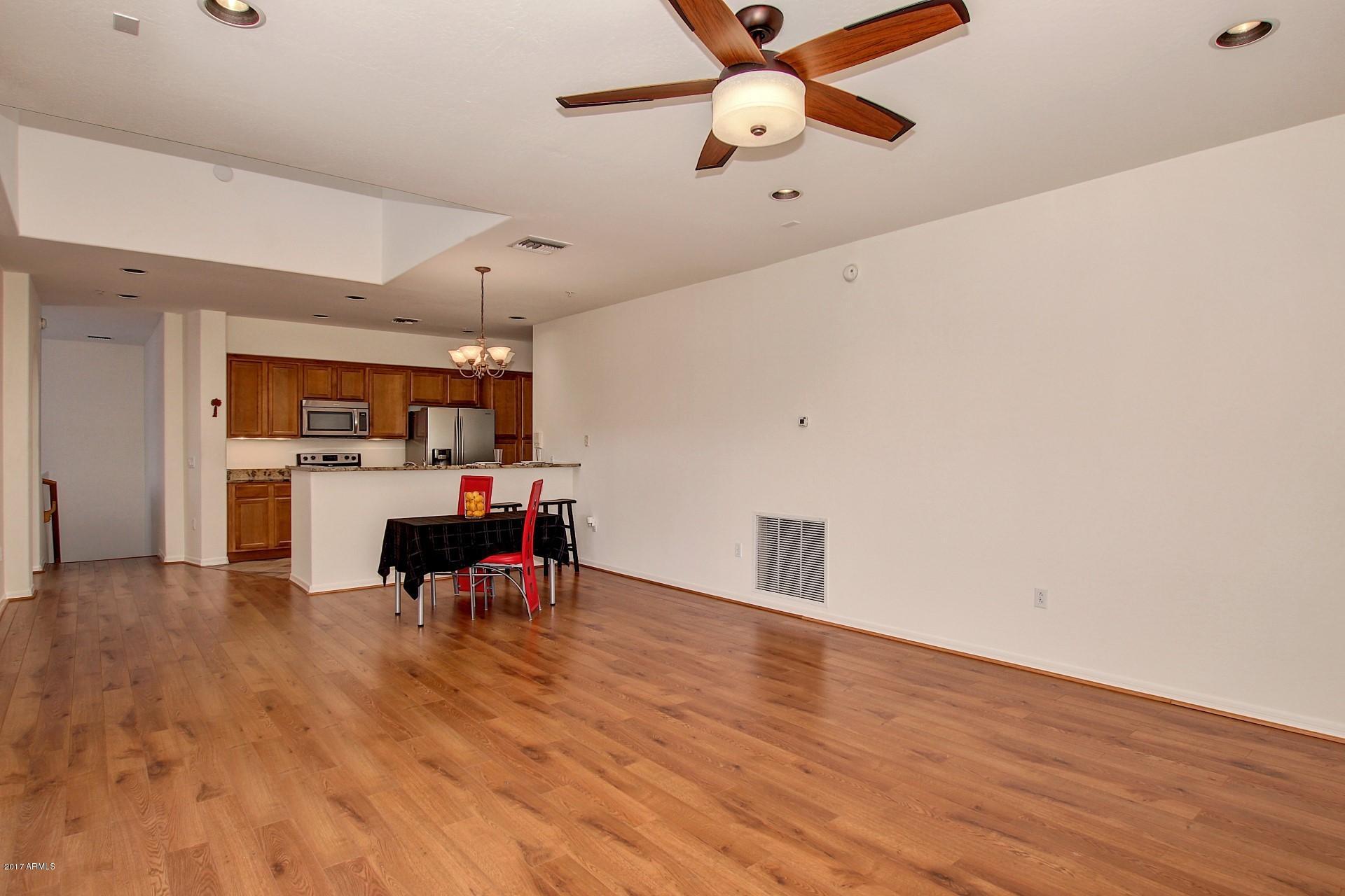 3935 East Rough Rider Road, Unit 1361 Phoenix, AZ 85050 - Photo 8 of 64 Large Entertaining Area