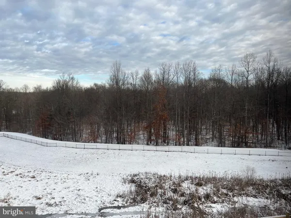 a view of house covered with snow
