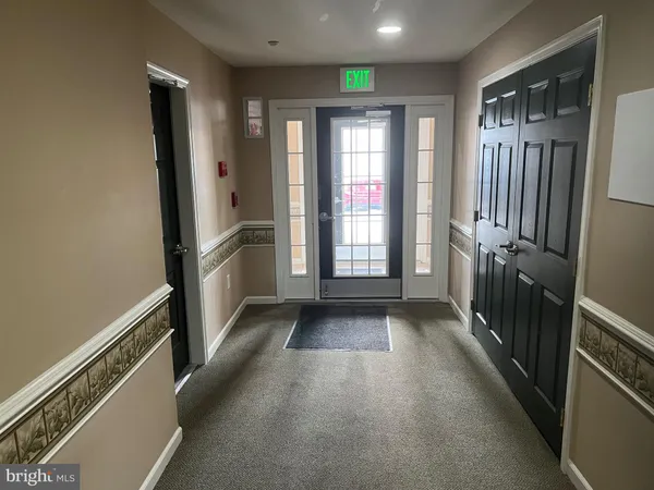 a view of hallway with windows