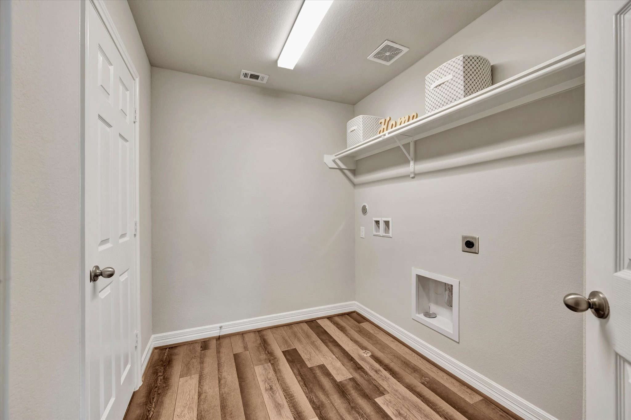 13420 Shellbark Way La Marque, TX 77568 - Photo 28 of 31 Conveniently located upstairs utility room.