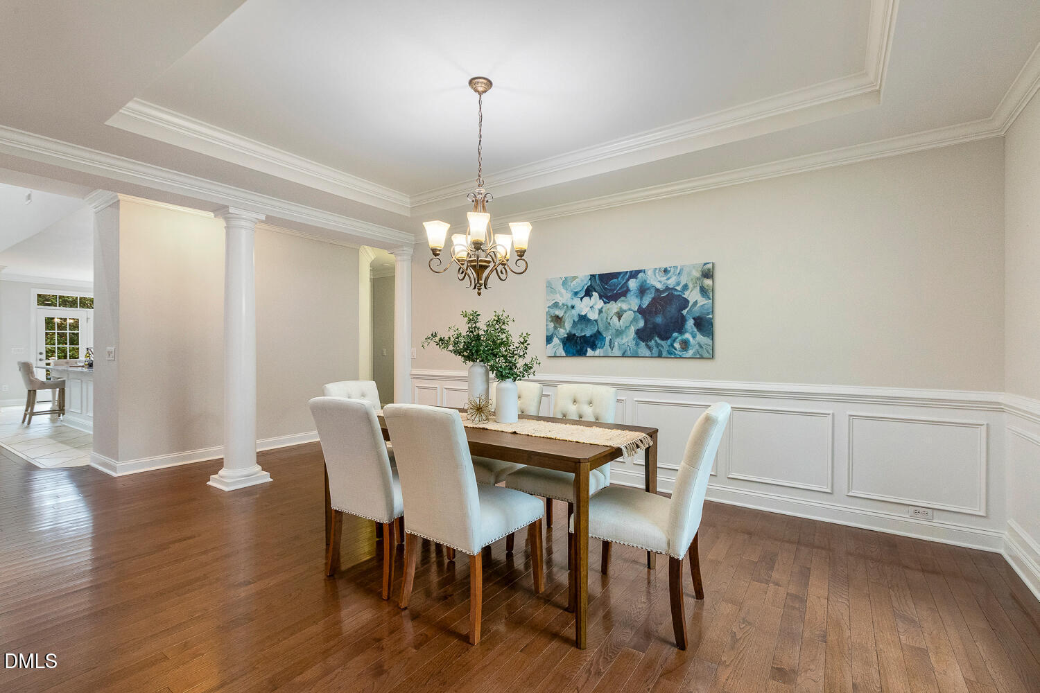 404 Vintage Hill Circle Apex, NC 27539 - Photo 12 of 82 a view of a dining room with furniture wooden floor and chandelier